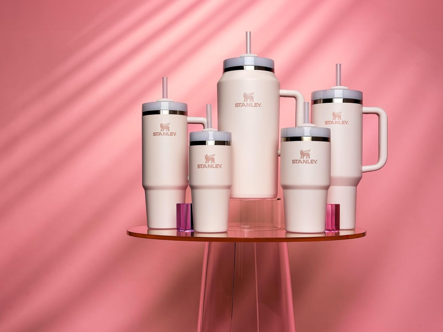 Stanley Quencher H2.0 Tumbler with Straw 20 oz | Flowstate 3-Position Lid | Cup Holder Compatible for Travel | Insulated Stainless Steel Cup | BPA-Free | Rose Quartz 2.0